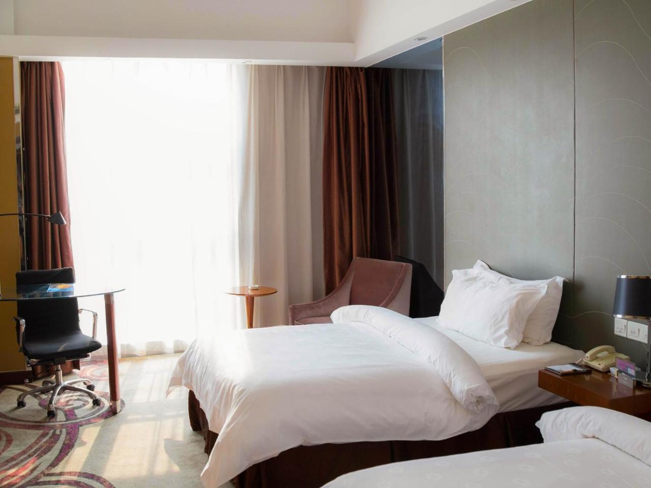 Hotel Metropolo, Zhenjiang, Railway Station Wanda Plaza à Zhenjiang  Extérieur photo